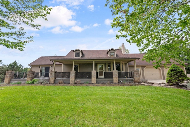 view of front of home with a chimney, a garage, a front yard, and a porch