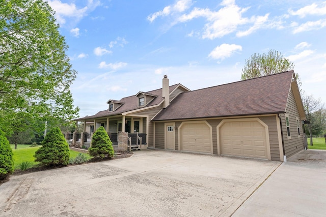 cape cod home with a garage, covered porch, roof with shingles, a chimney, and driveway