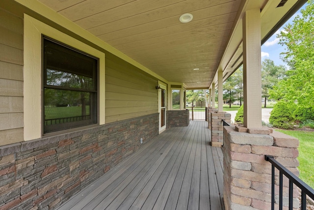 wooden deck featuring a porch