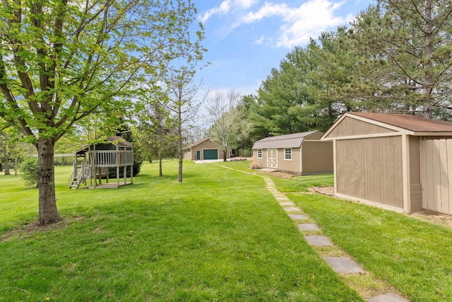 view of yard featuring an outbuilding and a storage shed