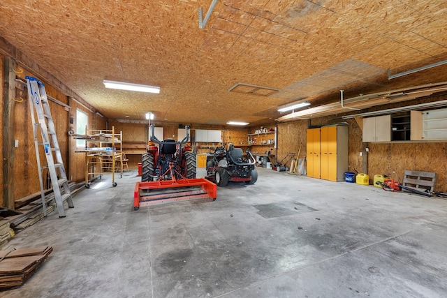 garage with a workshop area