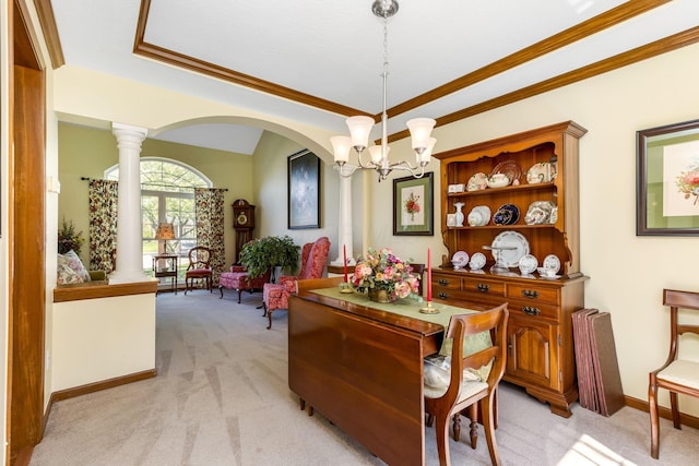 dining space featuring an inviting chandelier, arched walkways, ornate columns, and light carpet