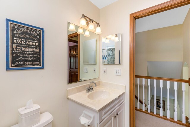 full bathroom featuring vanity and toilet