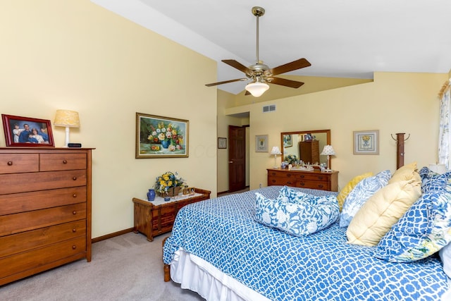 carpeted bedroom with visible vents, baseboards, ceiling fan, and vaulted ceiling