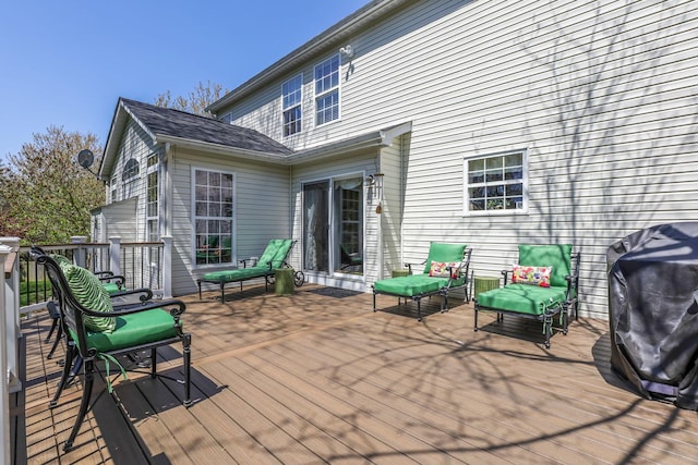 wooden terrace featuring grilling area