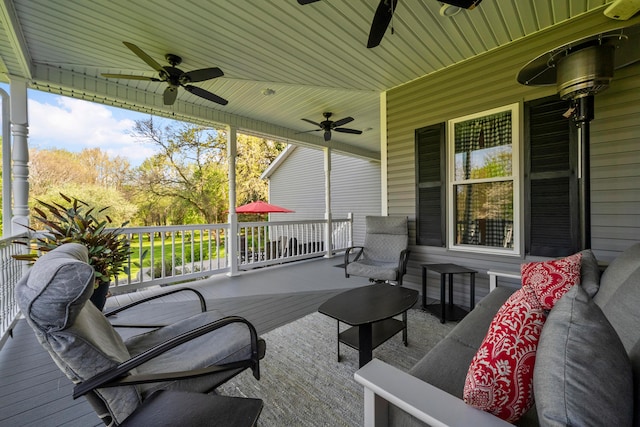 view of patio featuring ceiling fan and outdoor lounge area