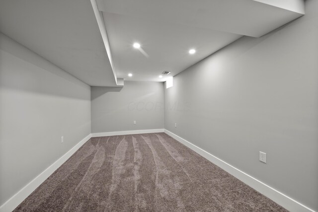 finished basement with carpet floors, recessed lighting, and baseboards
