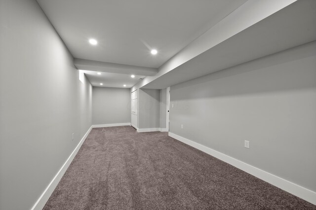 finished below grade area featuring carpet flooring, recessed lighting, and baseboards