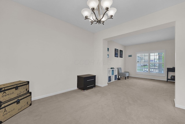 4441 Butler Farms Dr, Columbus, OH 43207 - carpeted empty room featuring a chandelier and baseboards