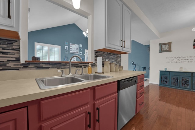 4441 Butler Farms Dr, Columbus, OH 43207 - kitchen featuring stainless steel dishwasher, a sink, tasteful backsplash, dark wood-style floors, and light countertops