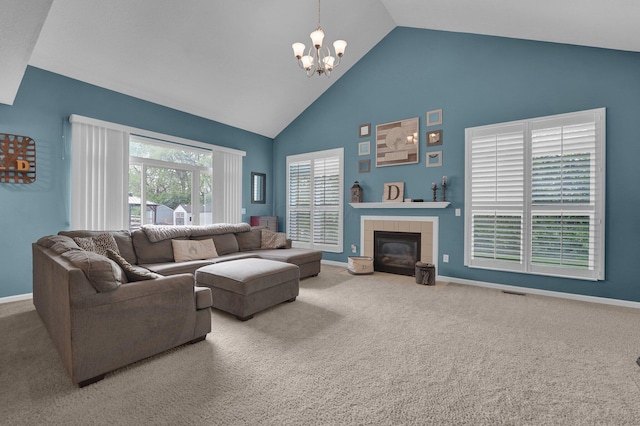 4441 Butler Farms Dr, Columbus, OH 43207 - carpeted living room with high vaulted ceiling, a chandelier, baseboards, and a tile fireplace