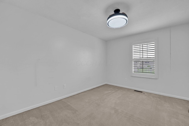 4441 Butler Farms Dr, Columbus, OH 43207 - empty room featuring baseboards and carpet flooring