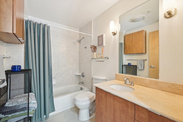 bathroom with tile patterned flooring, shower / bath combo with shower curtain, toilet, and vanity