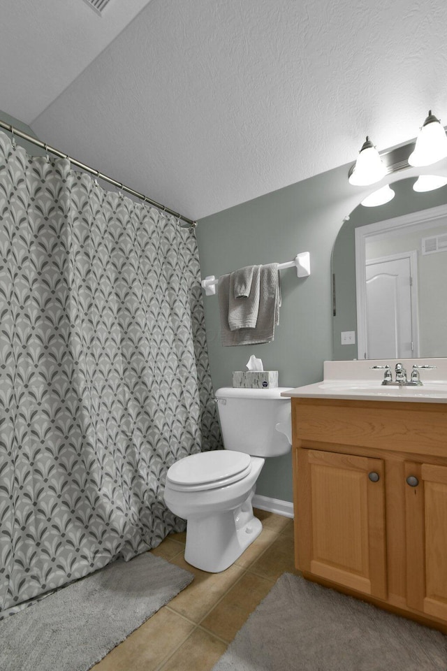 5914 Grant Run Estates Dr, Grove City, OH 43123 - full bathroom featuring tile patterned flooring, vanity, toilet, a textured ceiling, and curtained shower