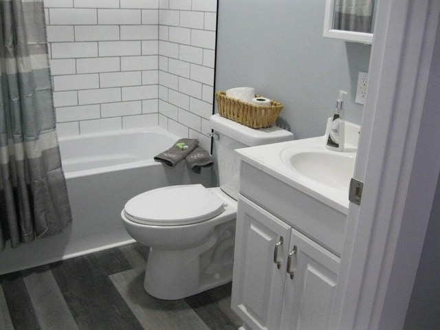 full bathroom with toilet, shower / bath combination with curtain, wood finished floors, and vanity