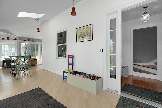 1108 W Church St, Newark, OH 43055 - interior space with a skylight, wood finished floors, and vaulted ceiling