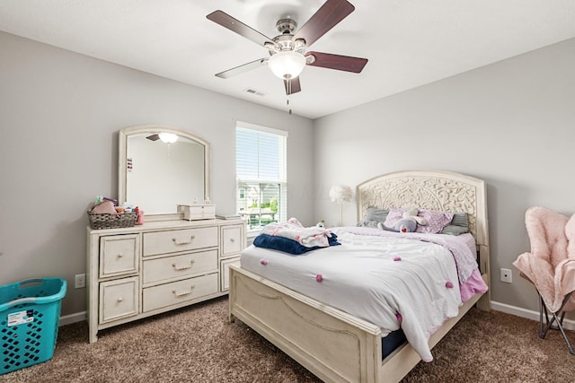 bedroom with baseboards, ceiling fan, carpet flooring, and visible vents