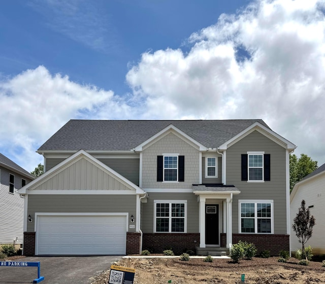 9920 Glenfield Ct Lot 51, Plain City, OH 43064 - craftsman inspired home with brick siding, asphalt driveway, and a garage
