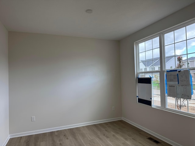 9920 Glenfield Ct Lot 51, Plain City, OH 43064 - empty room featuring wood finished floors
