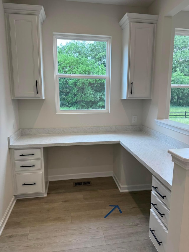 9920 Glenfield Ct Lot 51, Plain City, OH 43064 - unfurnished office with built in study area and light wood-style floors