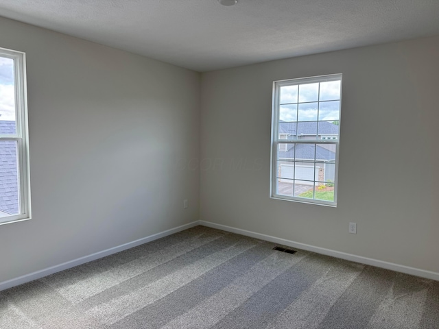 9920 Glenfield Ct Lot 51, Plain City, OH 43064 - carpeted spare room with baseboards
