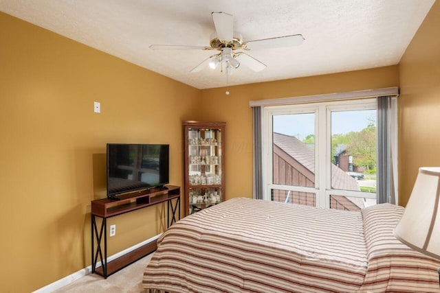 4917 Whistlewood Ln Unit 5, Westerville, OH 43081 - carpeted bedroom with baseboards and ceiling fan