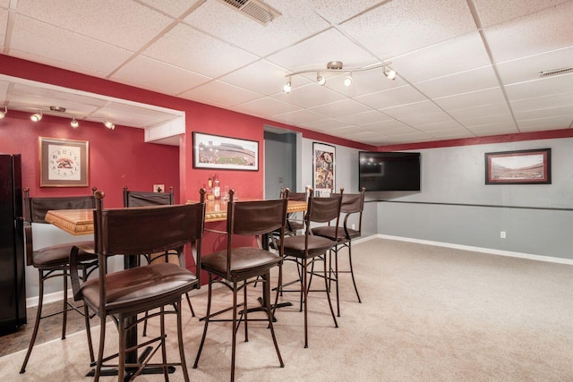 4917 Whistlewood Ln Unit 5, Westerville, OH 43081 - bar with visible vents, baseboards, a bar, rail lighting, and carpet
