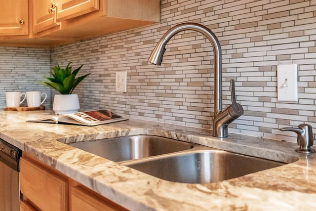 4917 Whistlewood Ln Unit 5, Westerville, OH 43081 - kitchen featuring light countertops, backsplash, stainless steel dishwasher, and a sink