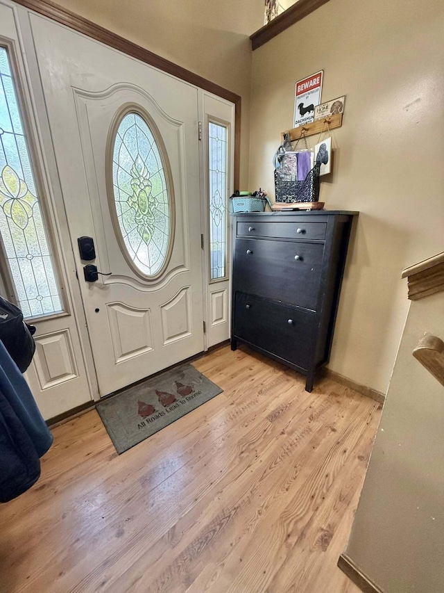 entryway with light wood-style flooring