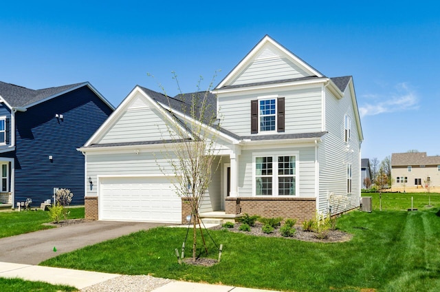 traditional-style house with a garage, central air condition unit, brick siding, a front lawn, and concrete driveway