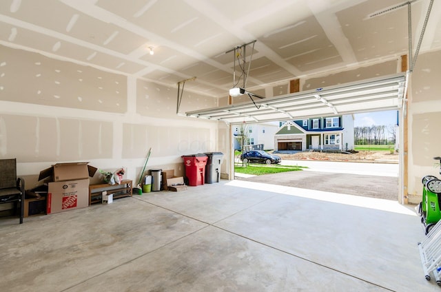 garage featuring a garage door opener