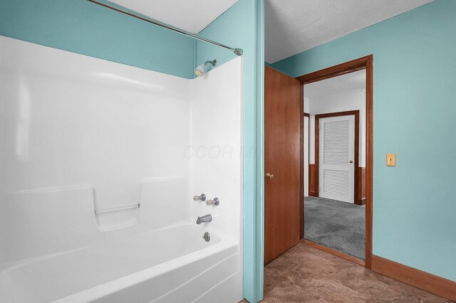 512 Henry St, Marion, OH 43302 - bathroom featuring baseboards and bathing tub / shower combination