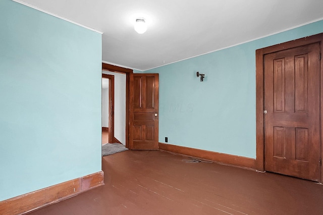 512 Henry St, Marion, OH 43302 - unfurnished room with baseboards and wood finished floors