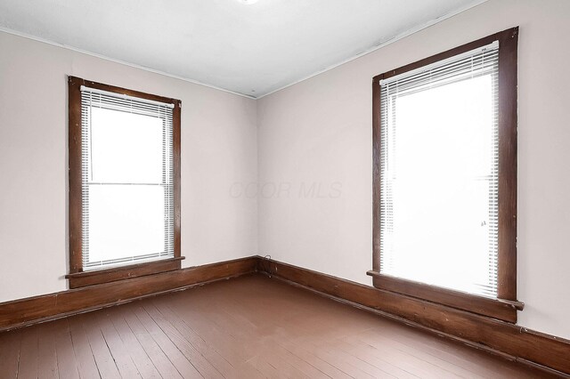 512 Henry St, Marion, OH 43302 - unfurnished room featuring crown molding and wood-type flooring