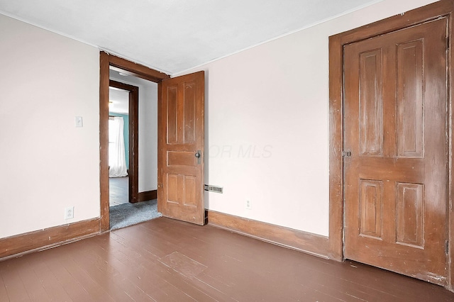 512 Henry St, Marion, OH 43302 - unfurnished room featuring baseboards and hardwood / wood-style floors