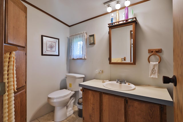 half bathroom featuring toilet, tile patterned floors, ornamental molding, and vanity