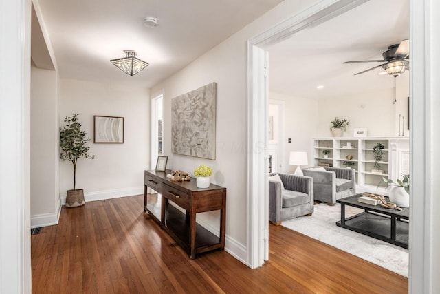 1800 Bryden Rd, Columbus, OH 43205 - hallway with dark wood finished floors and baseboards