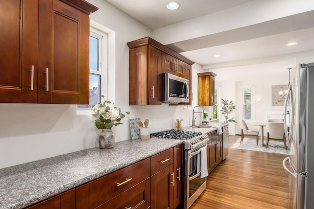 1800 Bryden Rd, Columbus, OH 43205 - kitchen with stainless steel appliances, a sink, light wood-style flooring, and recessed lighting