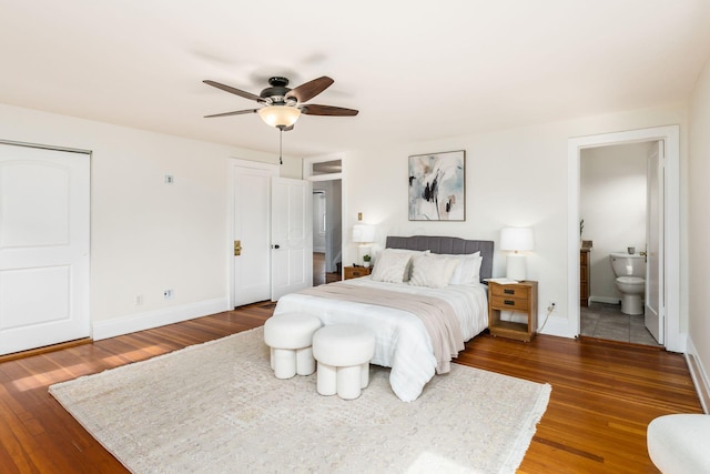 1800 Bryden Rd, Columbus, OH 43205 - bedroom with wood finished floors, baseboards, and two closets
