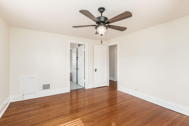 1800 Bryden Rd, Columbus, OH 43205 - unfurnished room with wood finished floors, baseboards, and ceiling fan