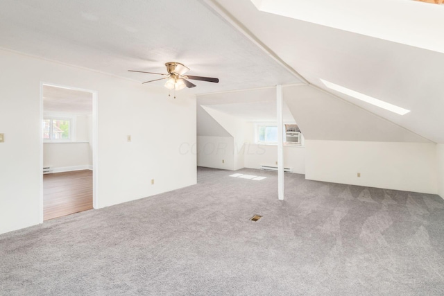 1800 Bryden Rd, Columbus, OH 43205 - bonus room with a baseboard radiator, carpet floors, a skylight, ceiling fan, and baseboard heating