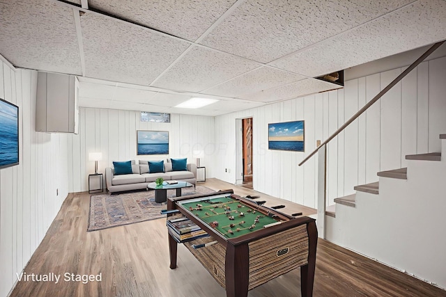 361 E Stafford Ave, Columbus, OH 43085 - rec room with wood finished floors and a drop ceiling