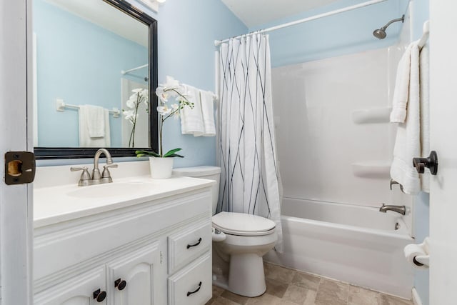 full bath with vanity, shower / bathtub combination with curtain, stone finish floor, and toilet