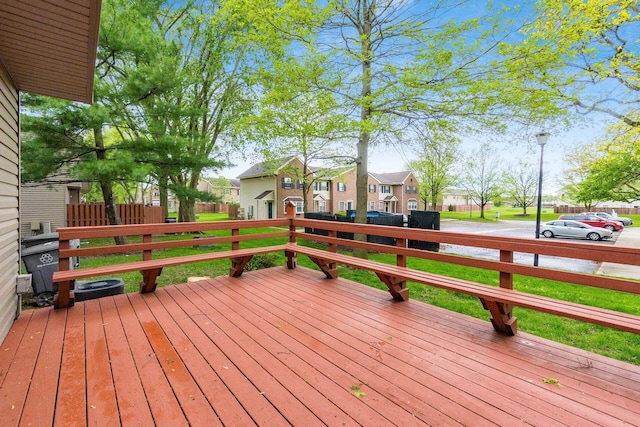 wooden terrace featuring a residential view