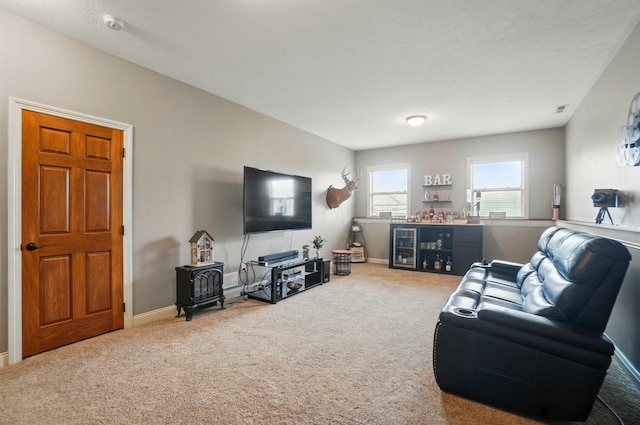 living room featuring carpet flooring, baseboards, and visible vents