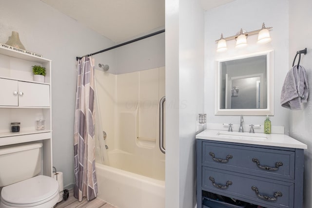 bathroom with vanity, shower / bath combo, and toilet