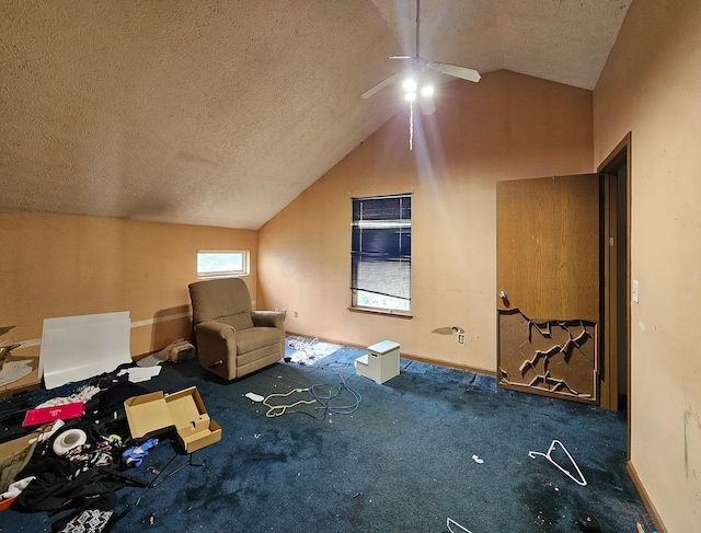 bonus room with carpet floors, a textured ceiling, a ceiling fan, baseboards, and vaulted ceiling