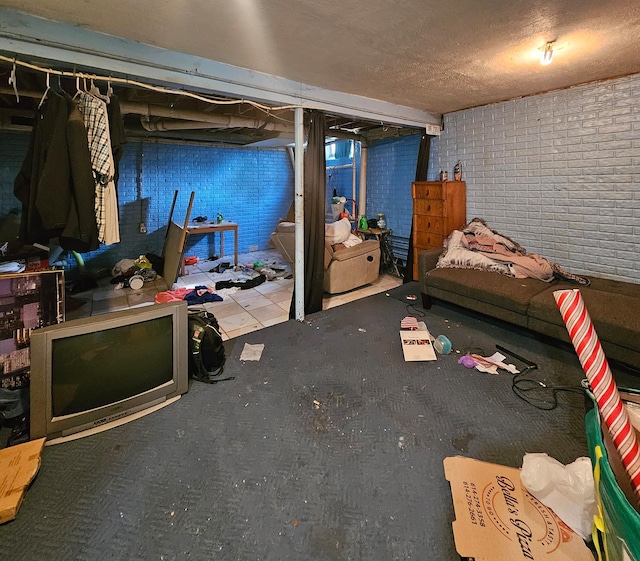 bedroom with brick wall