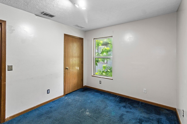 353 Clarendon Ave, Columbus, OH 43223 - carpeted empty room with baseboards and a textured ceiling