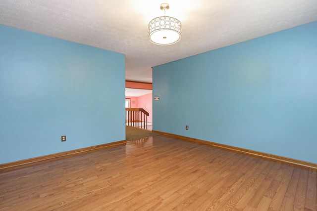 5308 Sharon Ave, Columbus, OH 43214 - unfurnished room featuring wood finished floors and baseboards